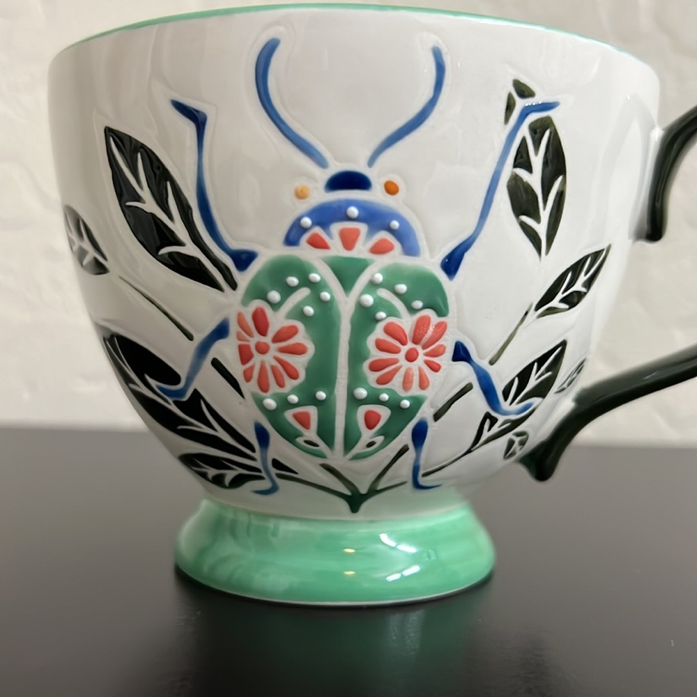COPY - World Market Mug Love Bug lady hearts shaped Beetle, textured.